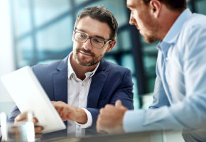 Tablet, teamwork and meeting of business people in office discussion. .png